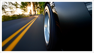 Car speeding down road